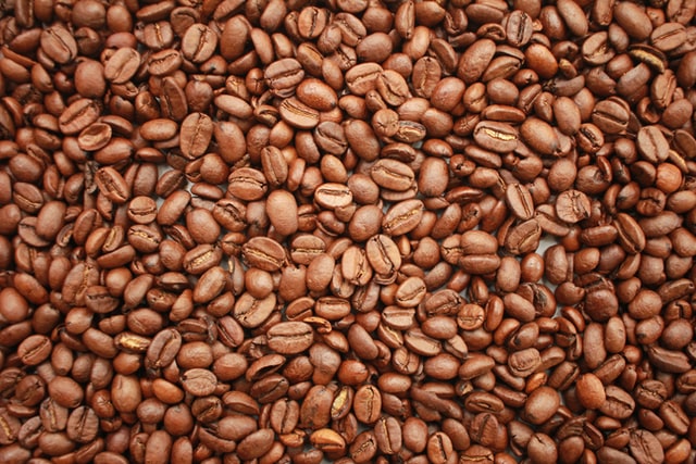 light roast coffee beans close up full screen