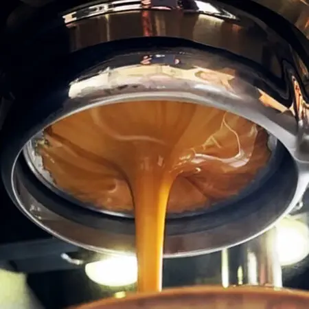 Espresso brewing close up