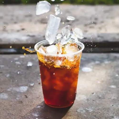 ice dropping into cup of cold brew, recipe for cold brew coffee