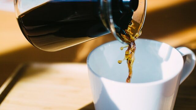 The Best Coffee Makers For Under 50 Bucks In 2026 1 coffee pouring into white mug
